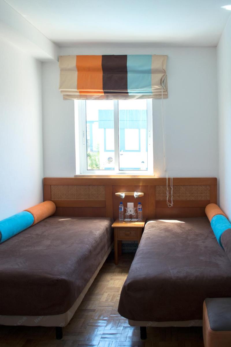 Uma cama ou camas num quarto em Hotel do Cerro