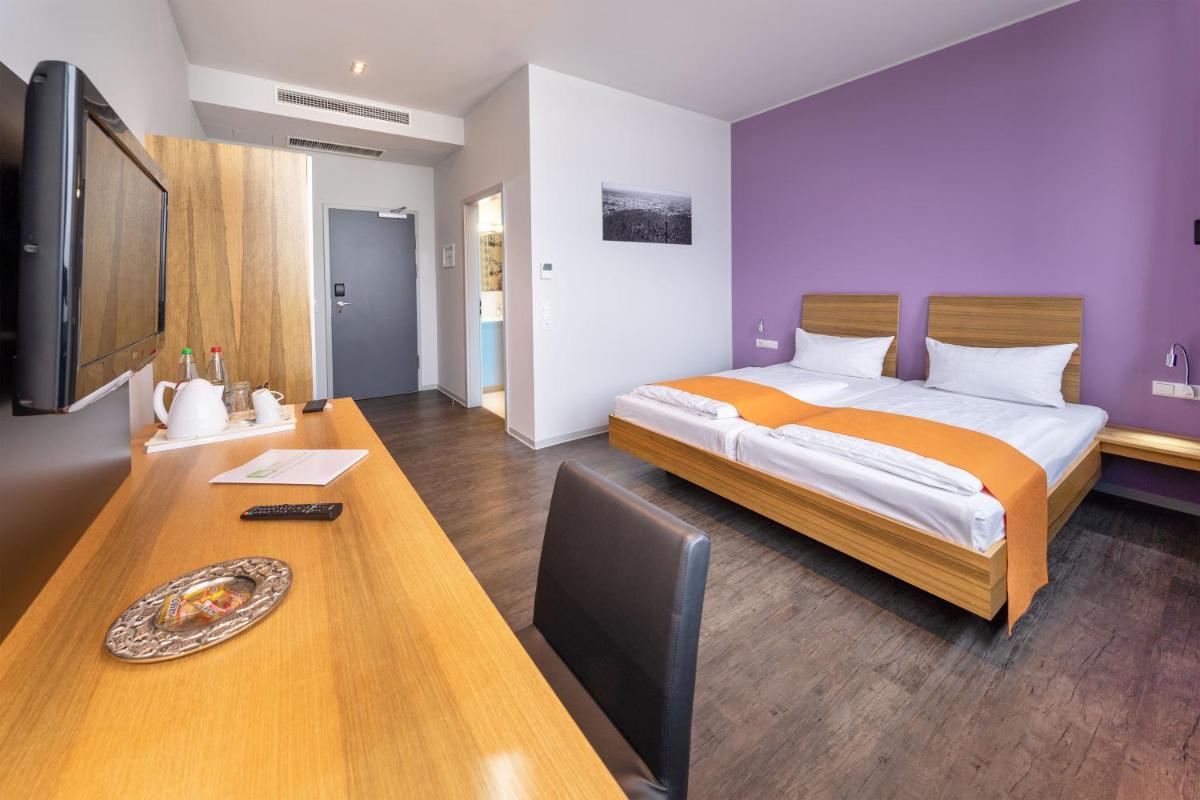AMH Airport-Messe-Hotel Stuttgart - Housity