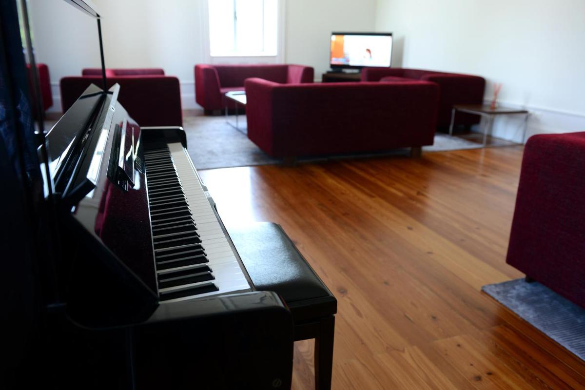 Uma televisão e/ou sistema de entretenimento em Hotel Quinta da Cruz & SPA