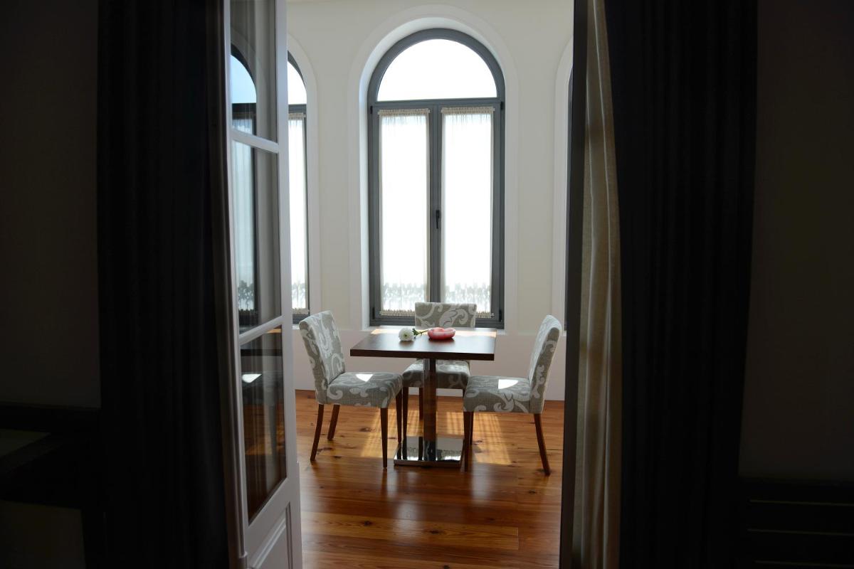 Uma área de estar em Hotel Quinta da Cruz & SPA