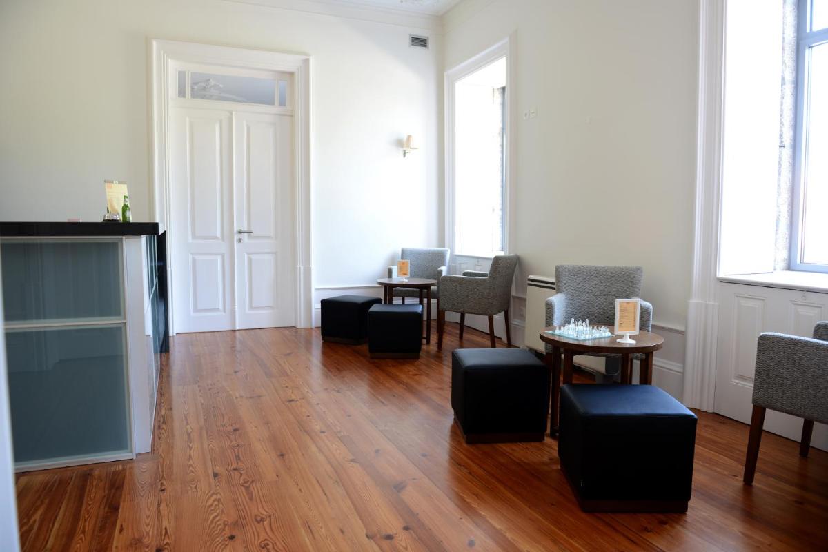 Uma área de estar em Hotel Quinta da Cruz & SPA