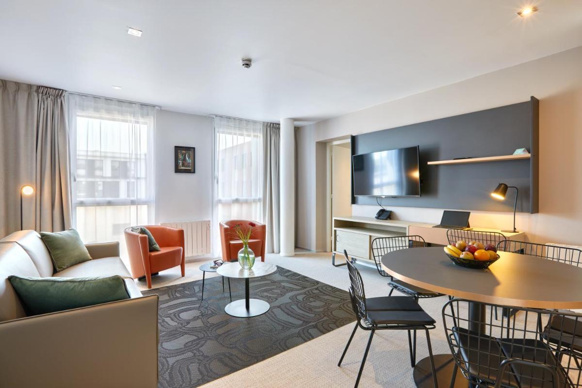 Coin salon dans l'établissement Aparthotel & Spa Adagio Vannes