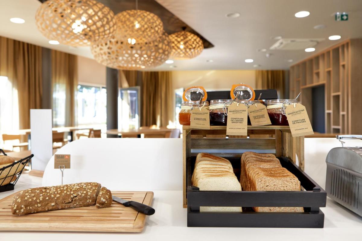 Coin salon dans l'établissement Aparthotel & Spa Adagio Vannes