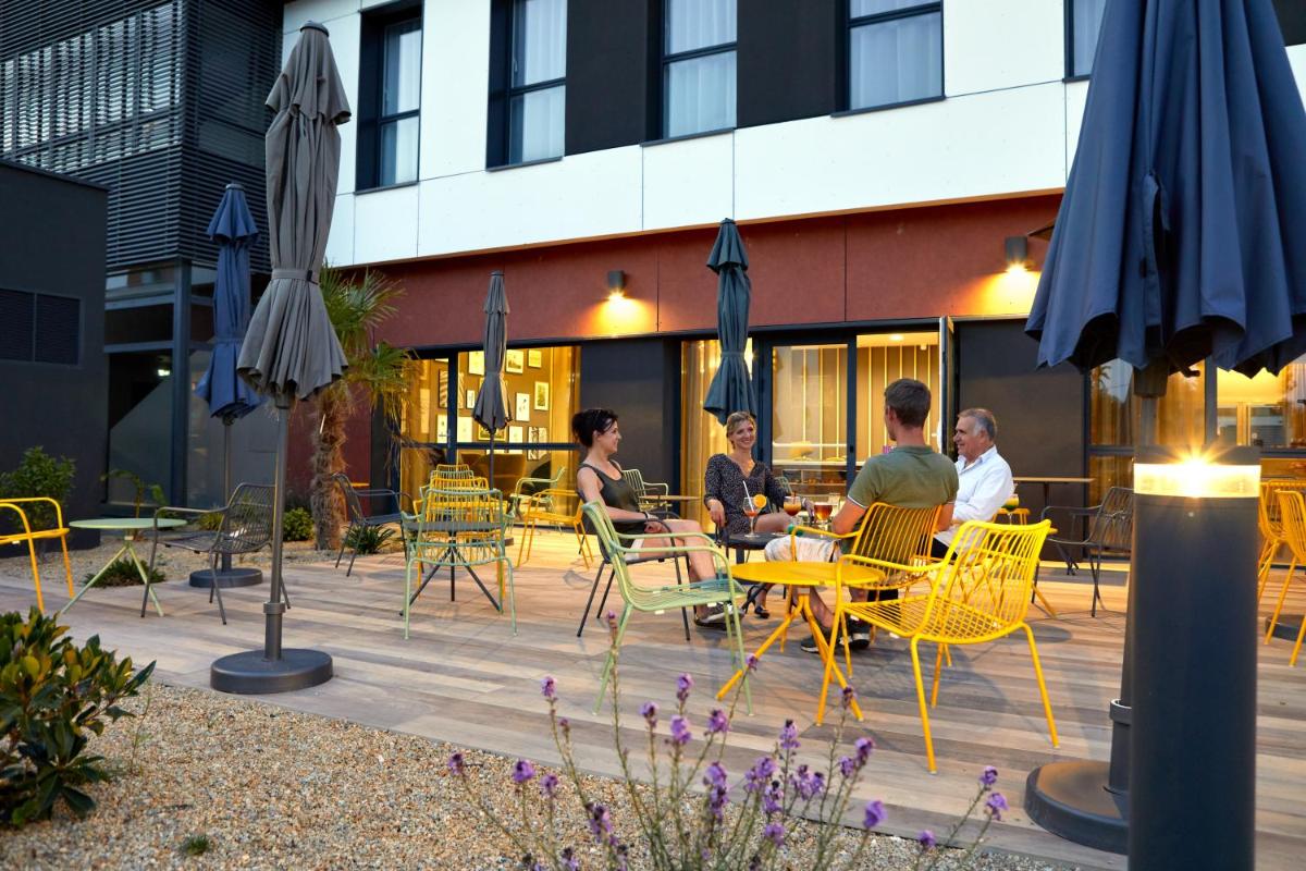 Restaurant ou autre lieu de restauration dans l'établissement Aparthotel & Spa Adagio Vannes