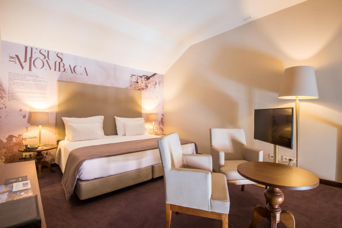 Uma cama ou camas num quarto em Vila Gale Collection Elvas