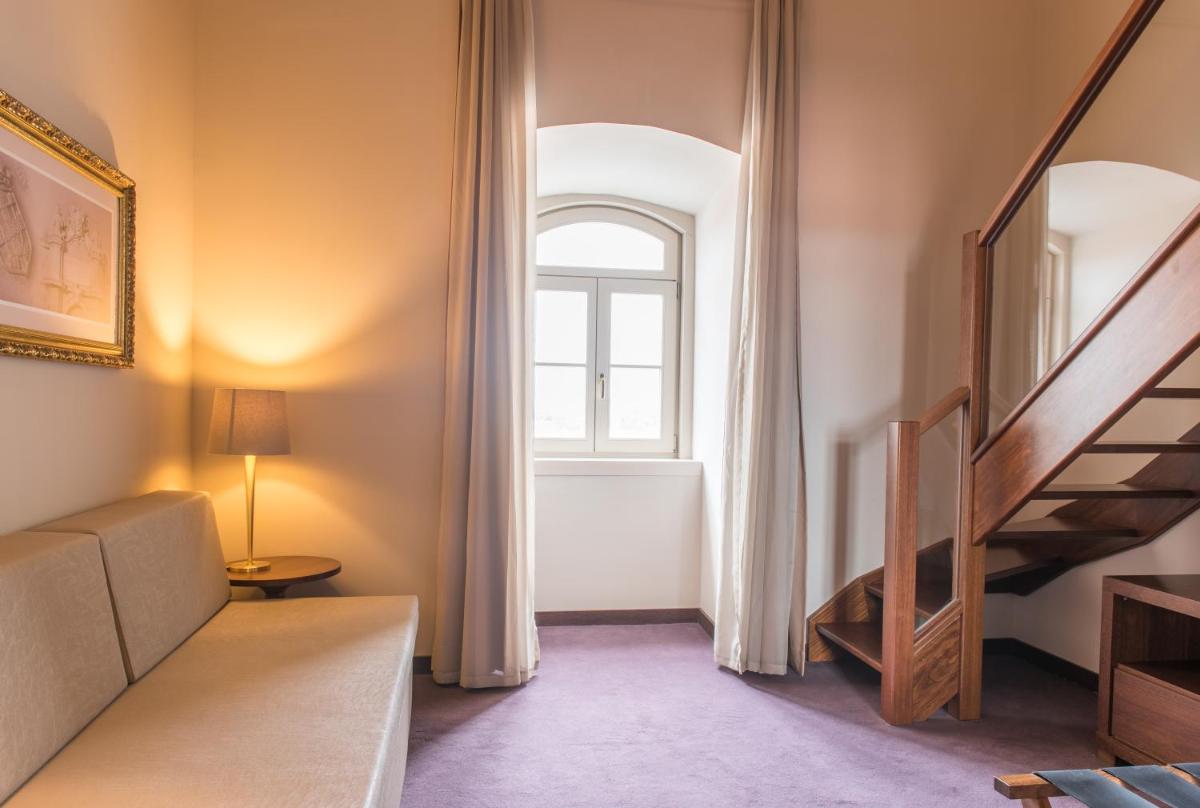 Uma cama ou camas num quarto em Vila Gale Collection Elvas