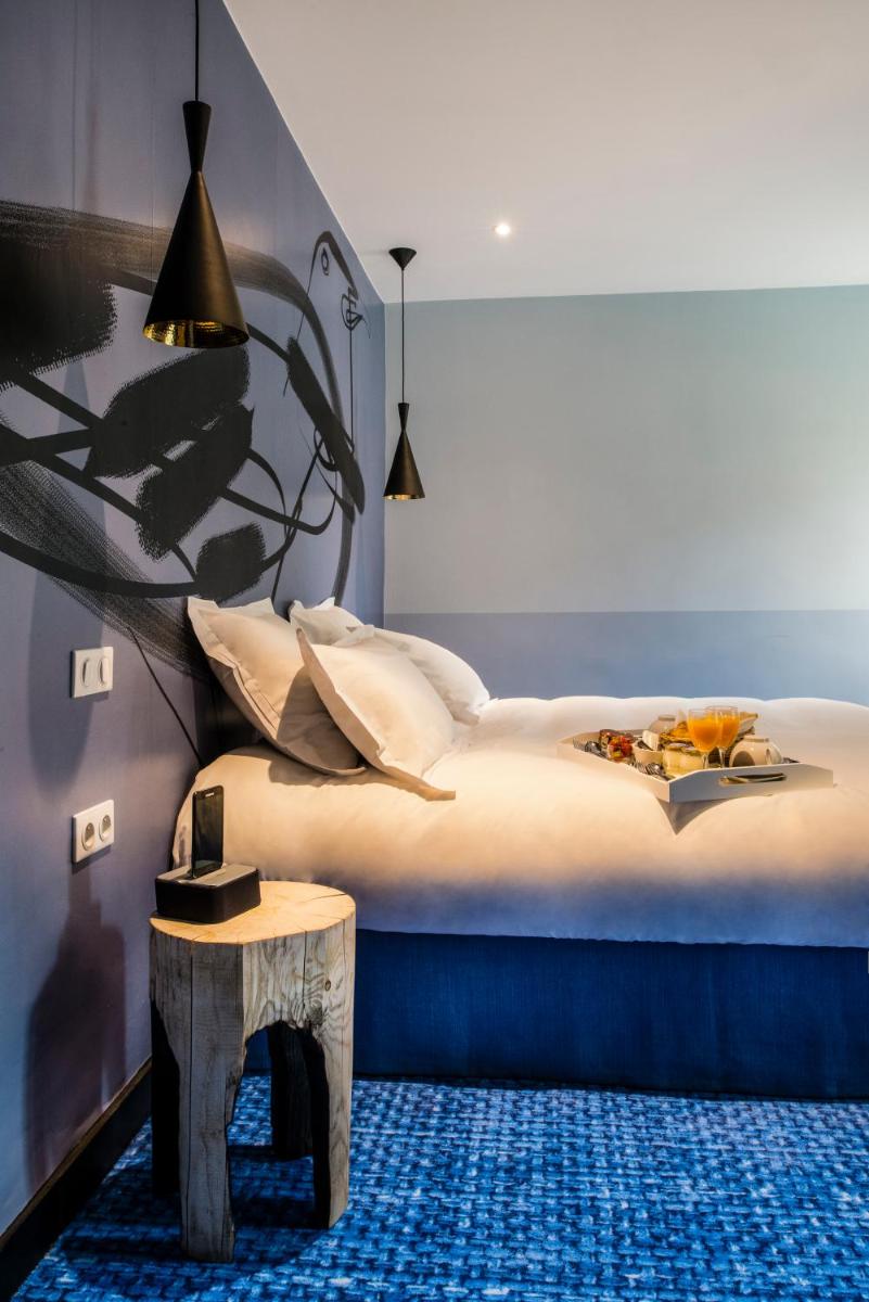 Un ou plusieurs lits dans un hébergement de l'établissement Jules César Hotel & Spa Arles - MGallery Collection