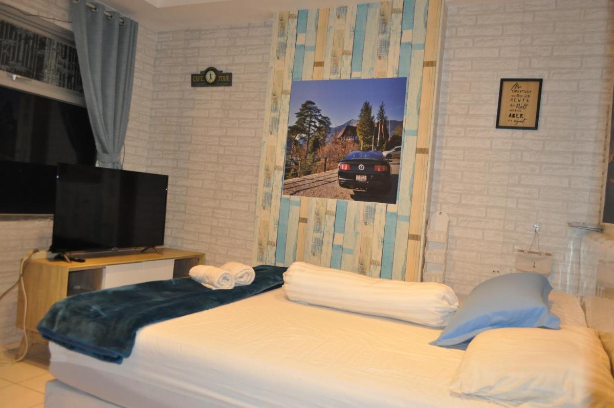 Apartment Grand Asia Afrika MUSTANG - Housity