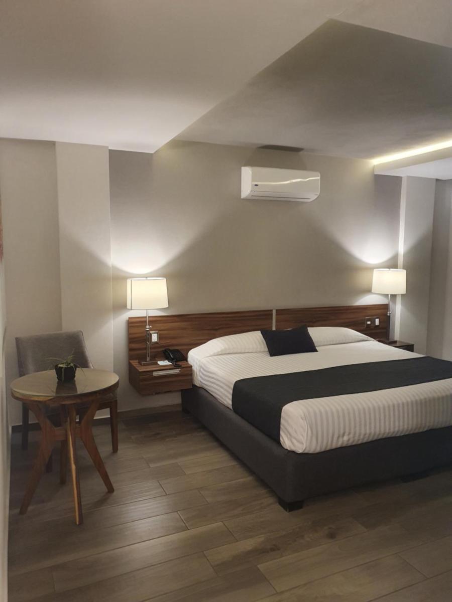Suitetrails - Estanza Hotel & Suites