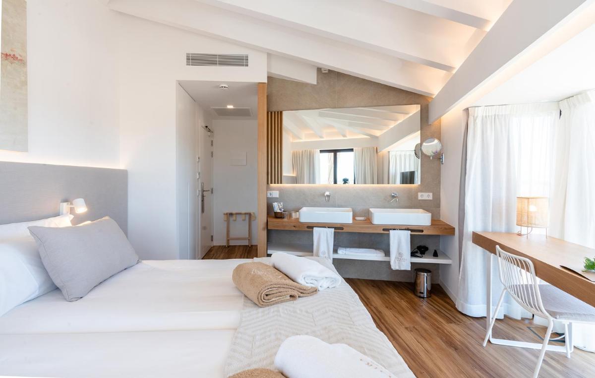 Cama o camas de una habitación en Ynaira hotel & Spa