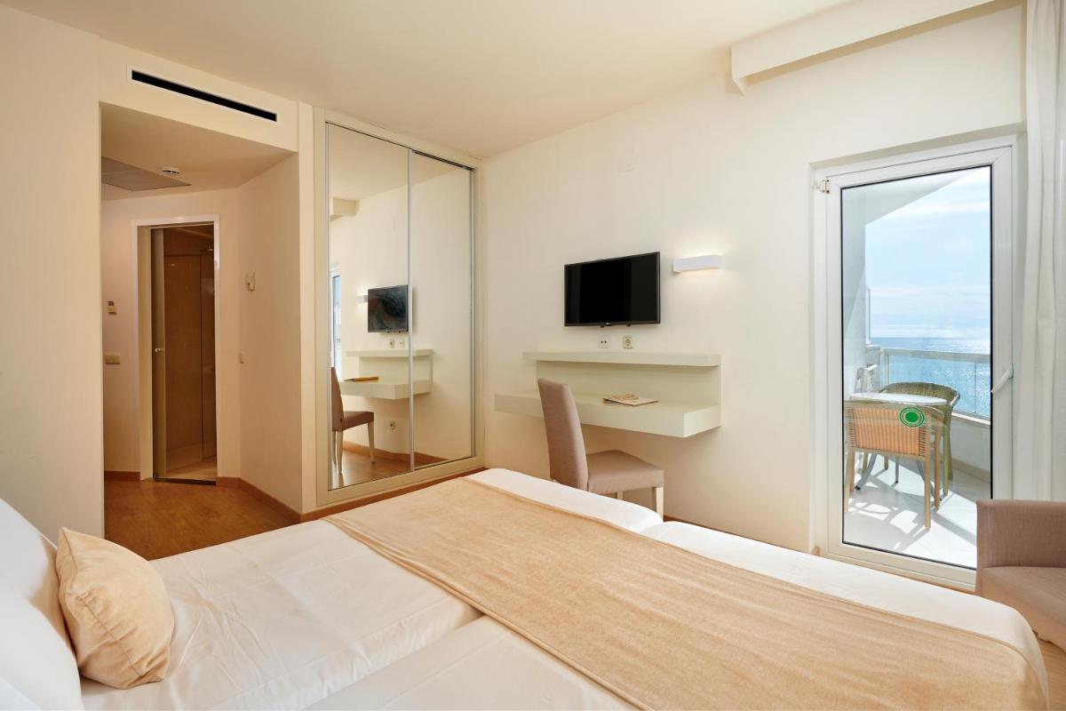 Cama o camas de una habitación en Hotel Sabina
