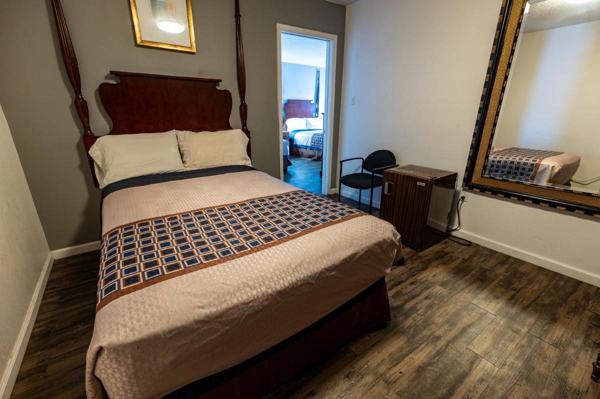 American Inn & Suites Russellville - Housity