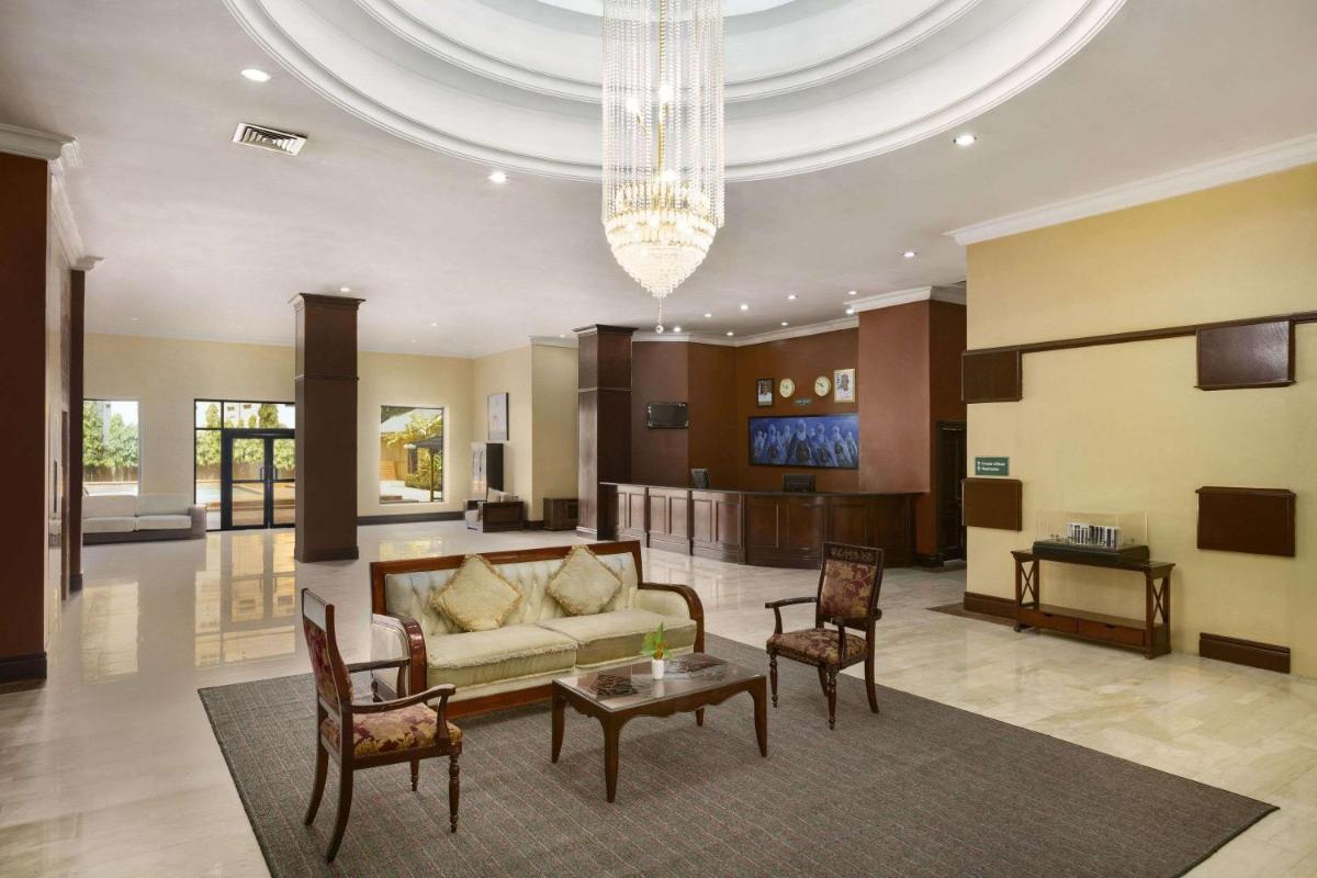 Hawthorn Suites by Wyndham Abuja - Housity