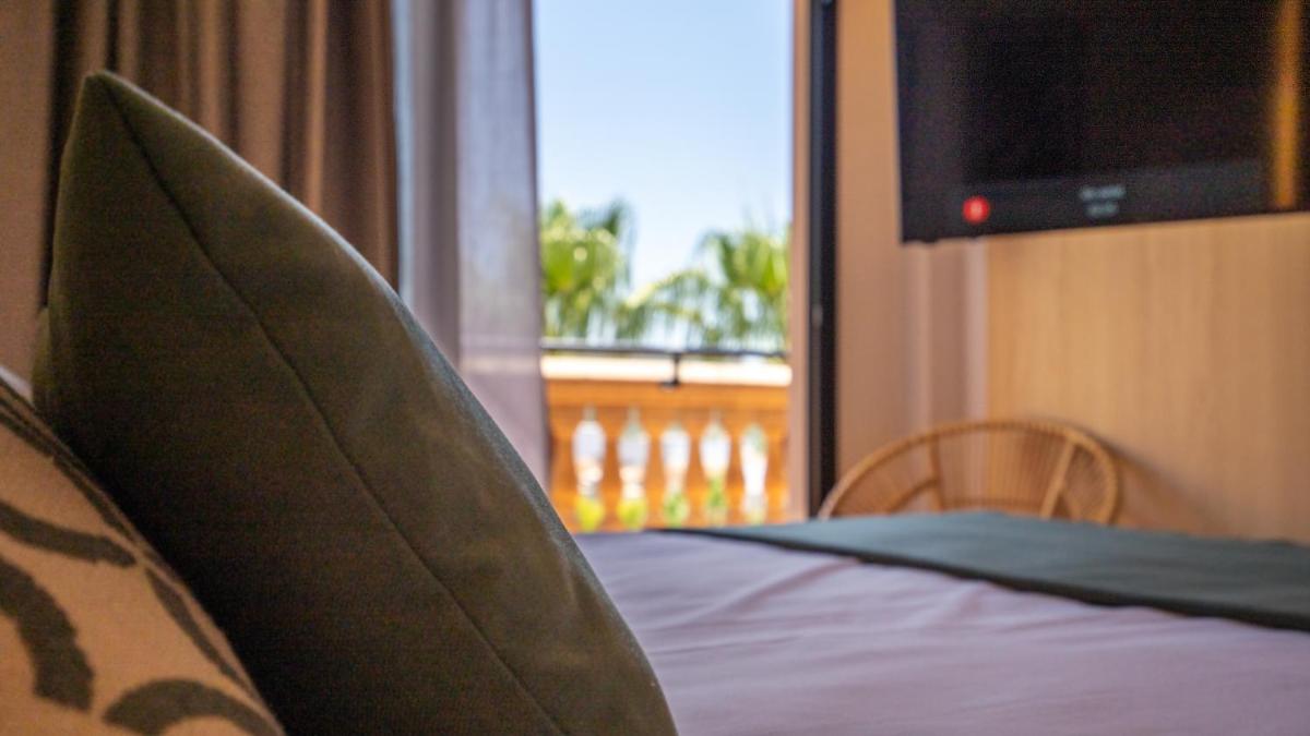Cama o camas de una habitación en Mon Port Hotel & Spa