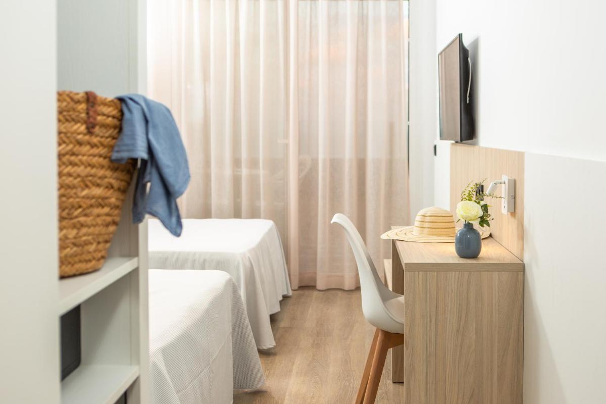 Cama o camas de una habitación en RVHotels Ametlla Mar