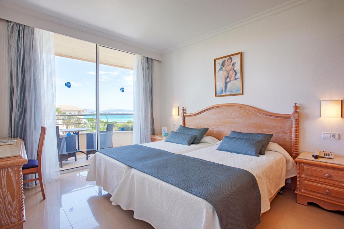 Cama o camas de una habitación en Grupotel Natura Playa