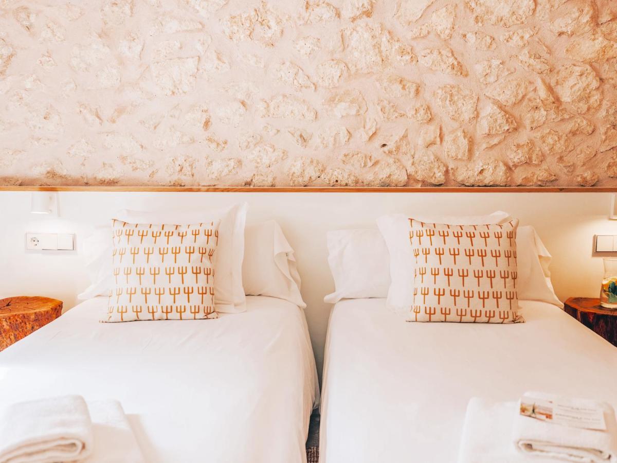 Cama o camas de una habitación en Can Cota Boutique - Turismo de interior