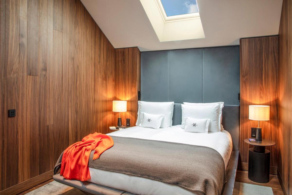 Un ou plusieurs lits dans un hébergement de l'établissement Jiva Hill Resort - Genève