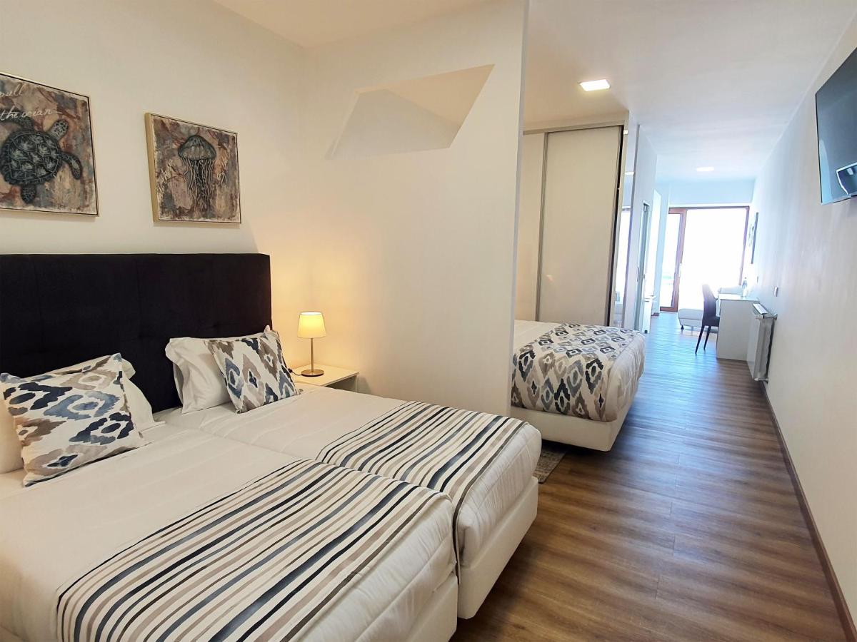 Uma cama ou camas num quarto em Miramar Hotel Spa & Apartments