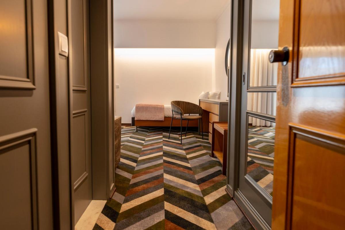 Uma área de estar em D. Afonso Hotel & SPA