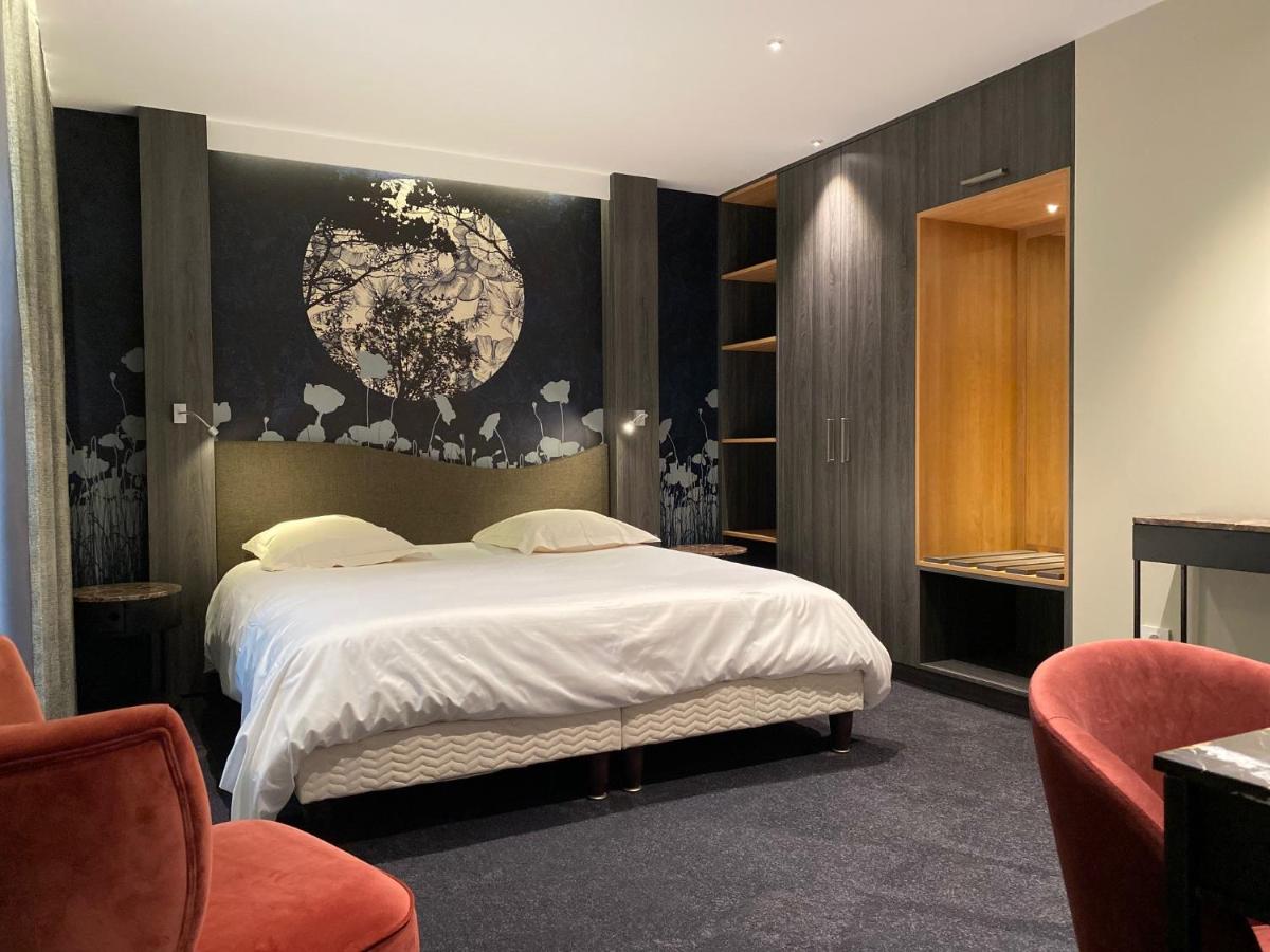 Un ou plusieurs lits dans un hébergement de l'établissement Au Soleil, Hôtel Restaurant & Spa