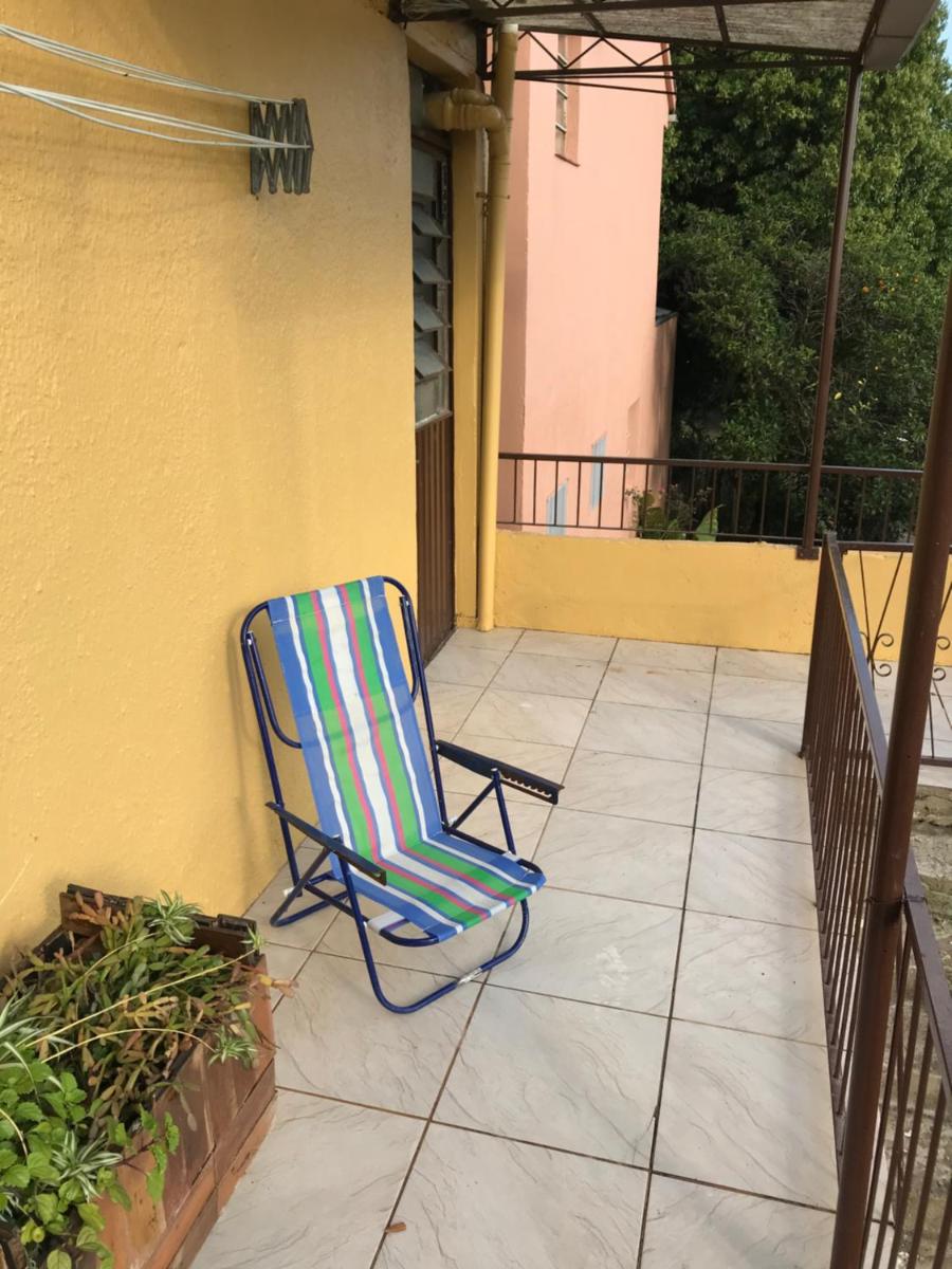 Apê completo com suíte, sacada e garagem fechada - Housity