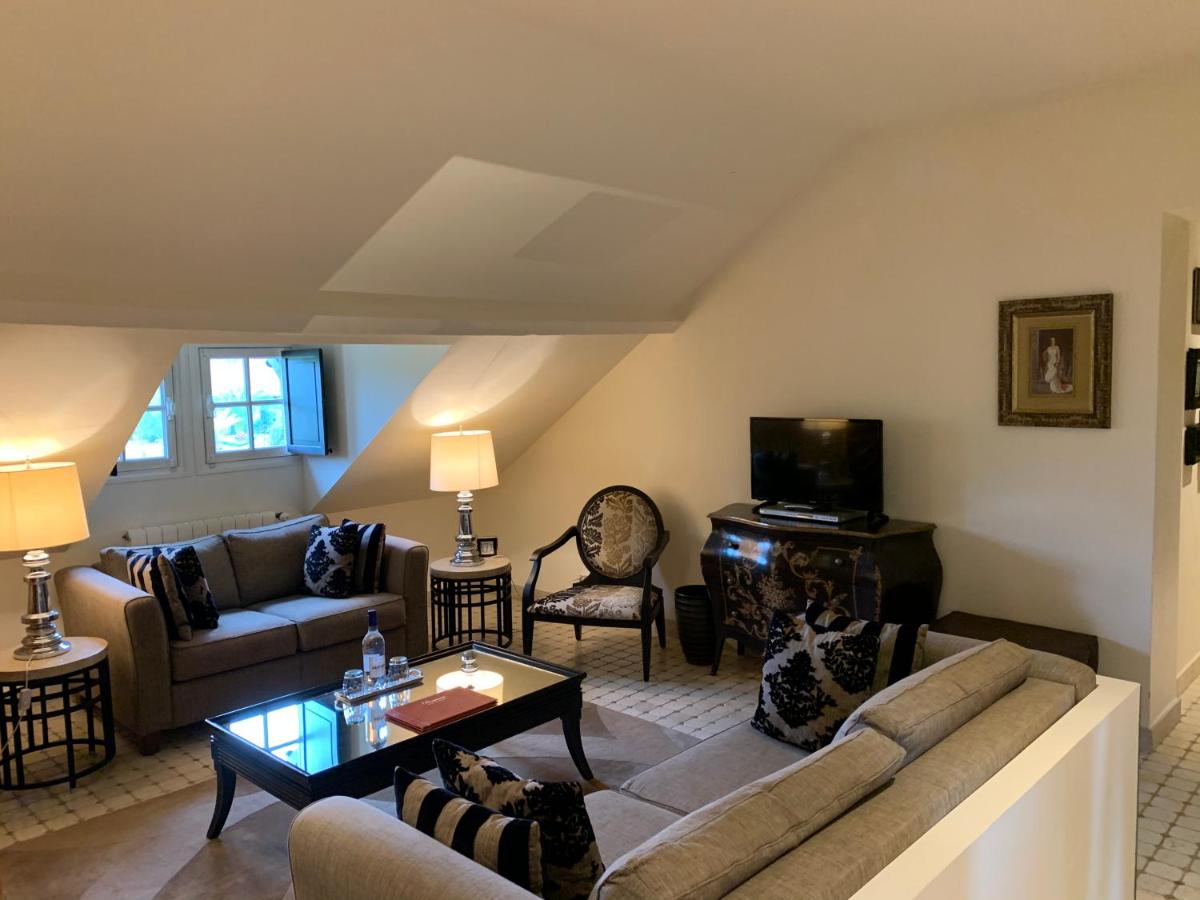 Coin salon dans l'établissement Beaumanoir Small Luxury Boutique Hotel