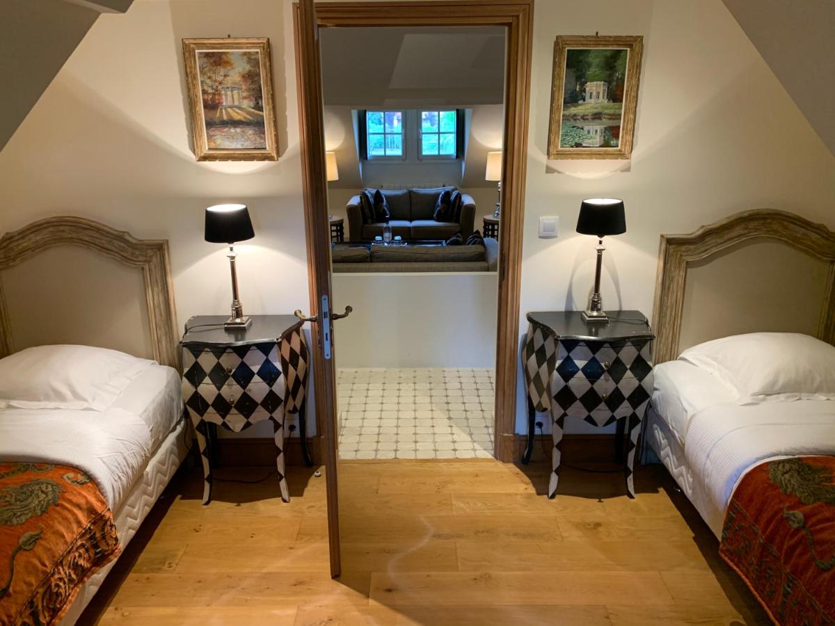 Un ou plusieurs lits dans un hébergement de l'établissement Beaumanoir Small Luxury Boutique Hotel