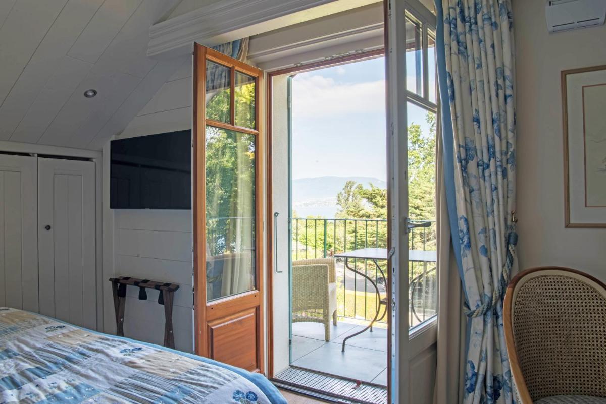 Un ou plusieurs lits dans un hébergement de l'établissement Villa Cécile