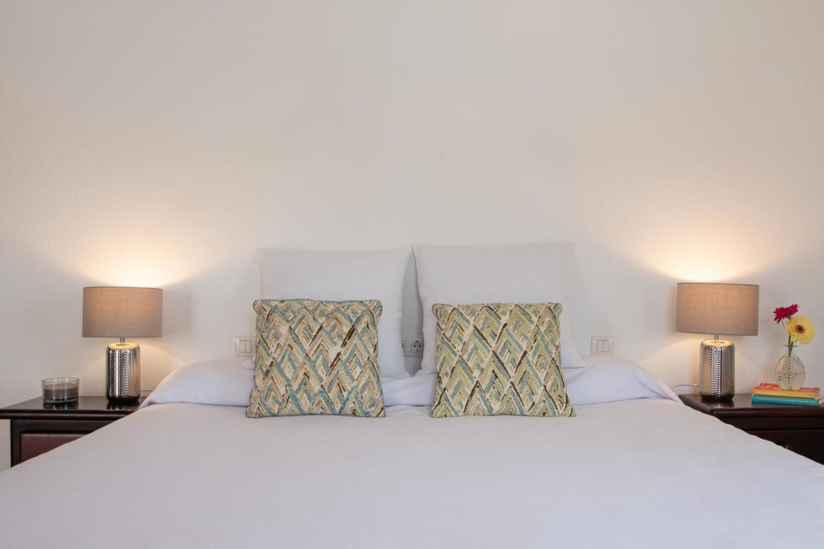 Cama o camas de una habitación en Casas Heddy, Well-being Resort