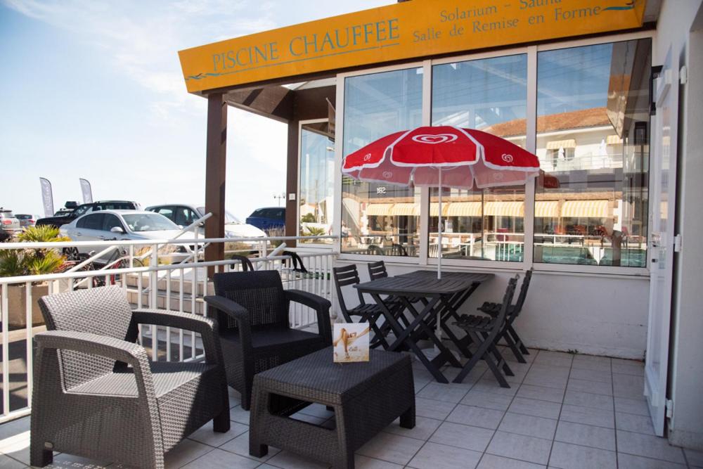 Restaurant ou autre lieu de restauration dans l'établissement Hotel Les Dunes