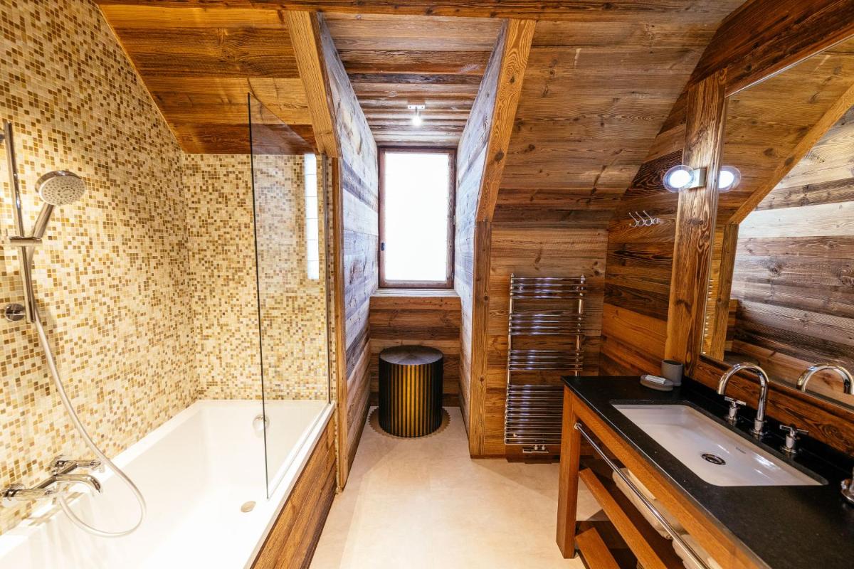Salle de bains dans l'établissement Hotel Le V de Vaujany