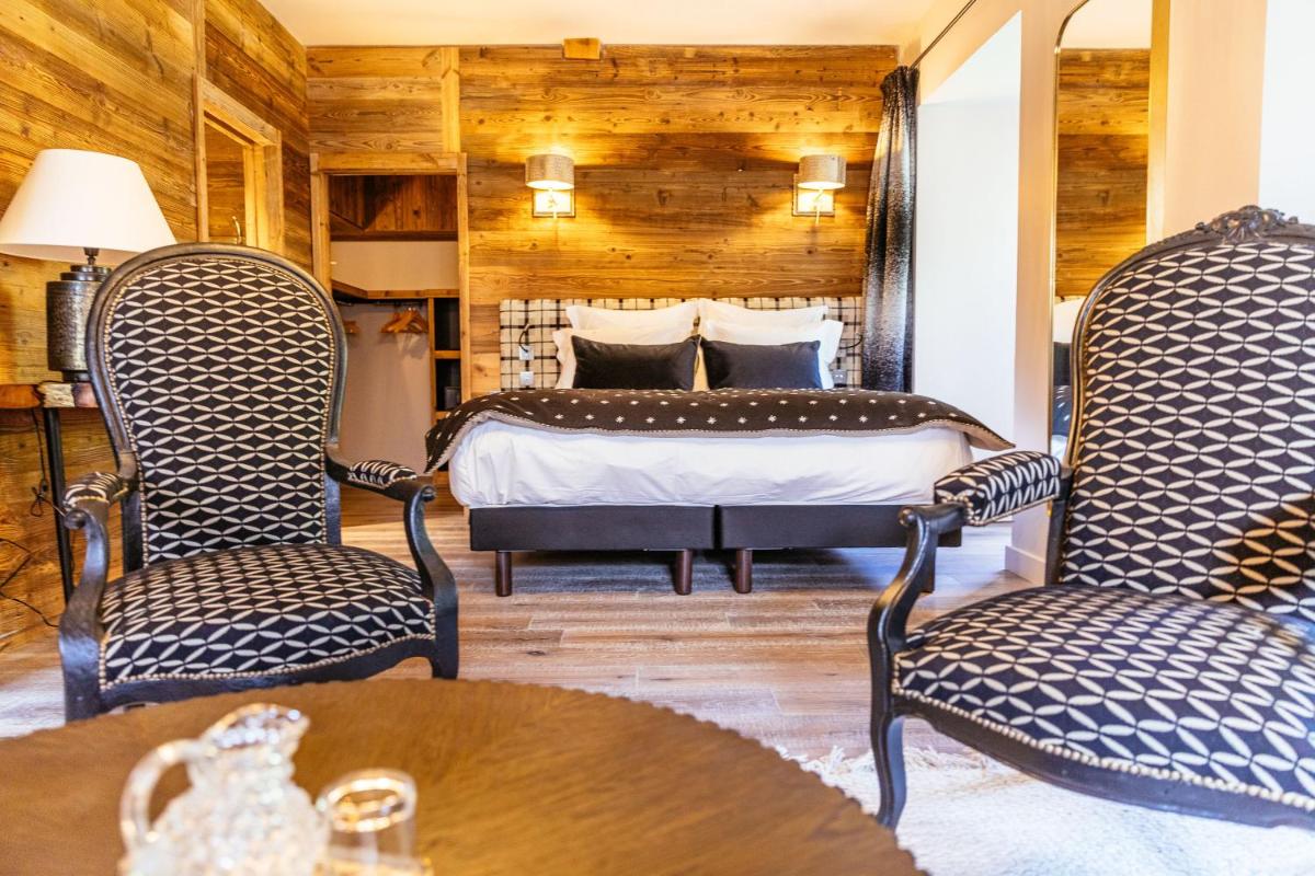 Coin salon dans l'établissement Hotel Le V de Vaujany