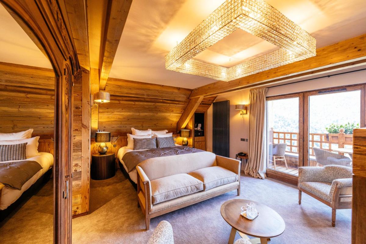 Coin salon dans l'établissement Hotel Le V de Vaujany