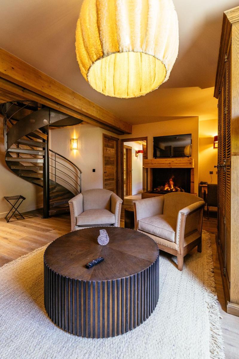 Coin salon dans l'établissement Hotel Le V de Vaujany