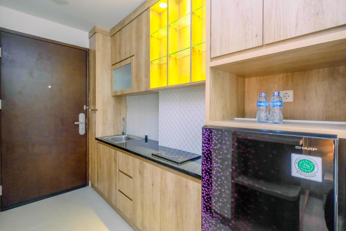 Minimalist Mustika Golf Residence Studio Apartment with City View By Travelio - Housity