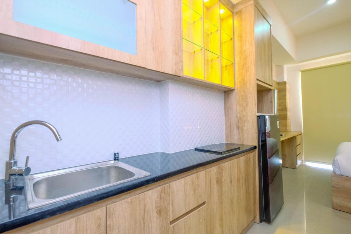 Minimalist Mustika Golf Residence Studio Apartment with City View By Travelio - Housity