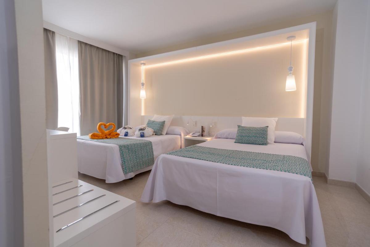 Cama o camas de una habitación en Gran Hotel Peñiscola