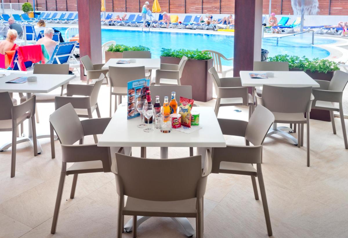 Un restaurante o sitio para comer en GHT Costa Brava & Spa