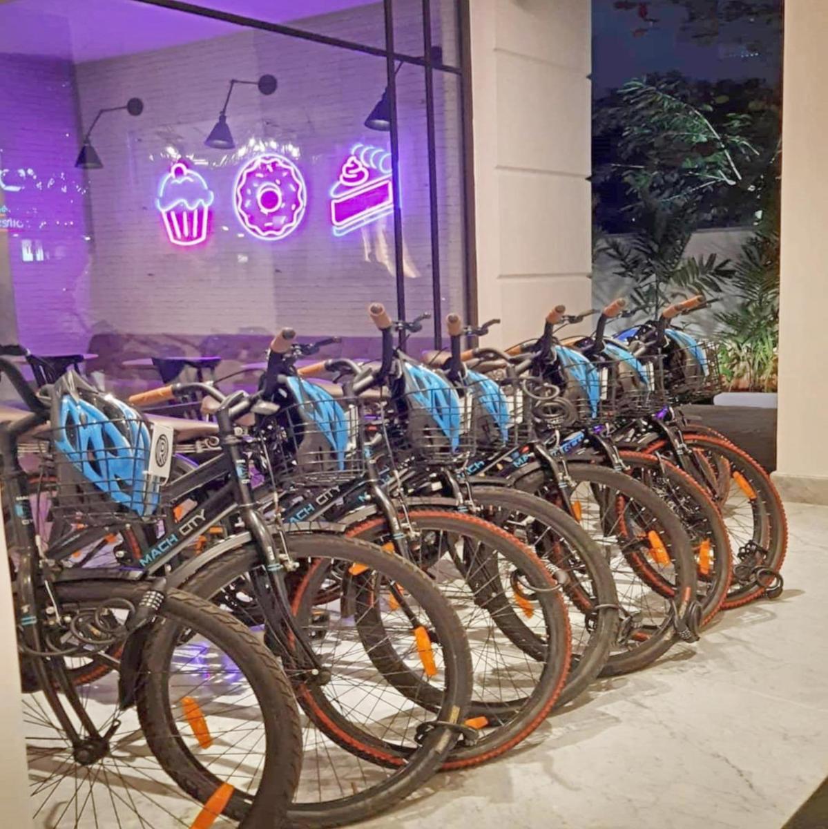 a group of bikes parked in a row in a store at The Residency Towers Puducherry in Puducherry