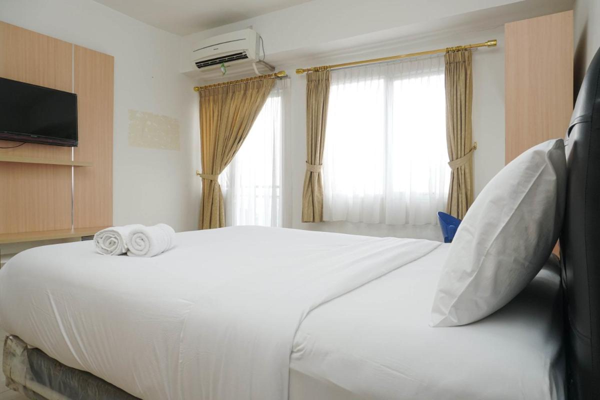 Minimalist Studio Park View Condominium Apartment near Mall By Travelio - Housity