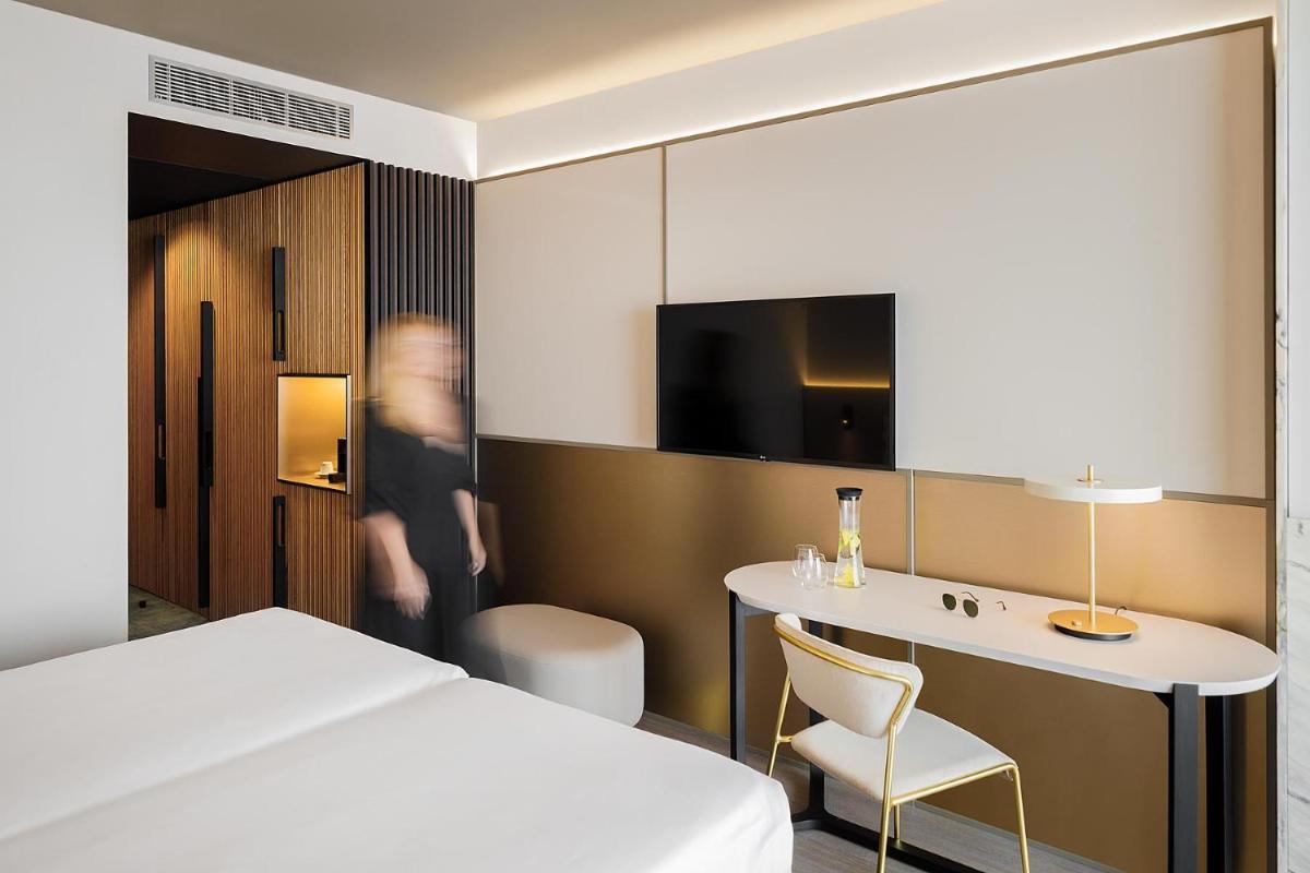 Uma cama ou camas num quarto em Azoris Royal Garden – Leisure & Conference Hotel