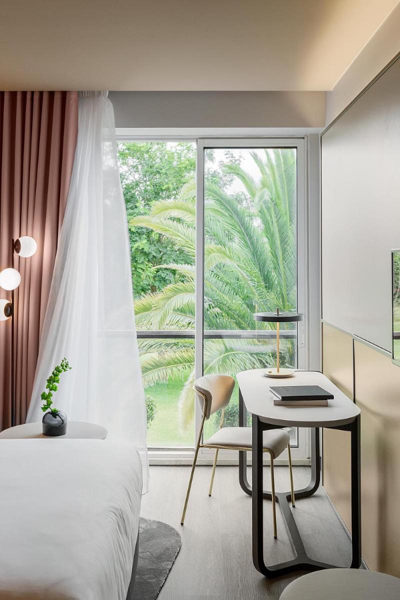 Uma cama ou camas num quarto em Azoris Royal Garden – Leisure & Conference Hotel