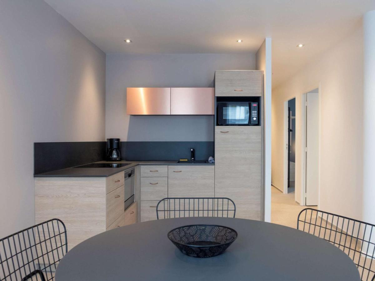Cuisine ou kitchenette dans l'établissement Aparthotel & Spa Adagio Vannes