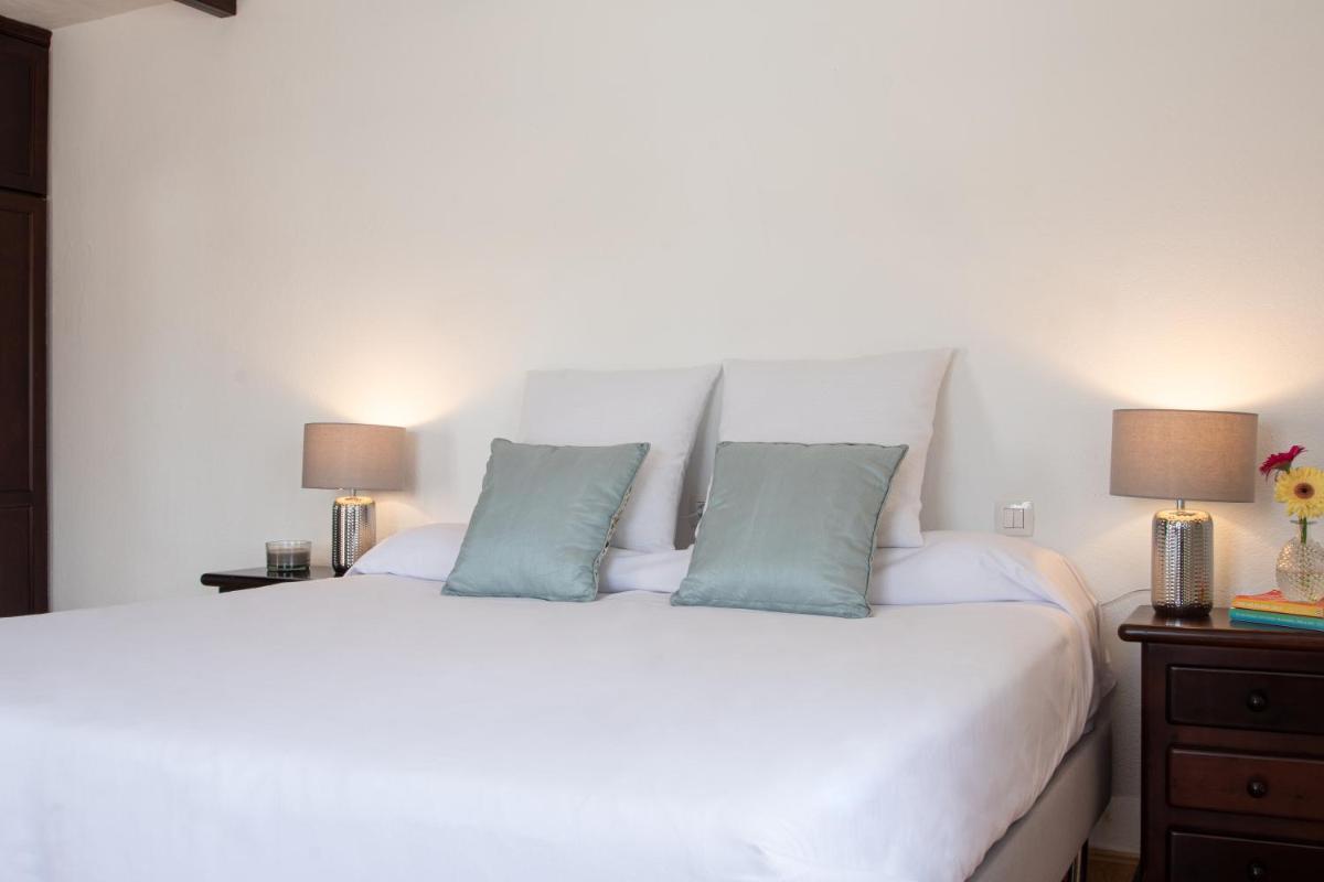 Cama o camas de una habitación en Casas Heddy, Well-being Resort