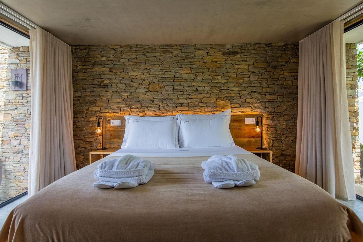 Uma cama ou camas num quarto em Quinta do Pedregal Hotel & Spa