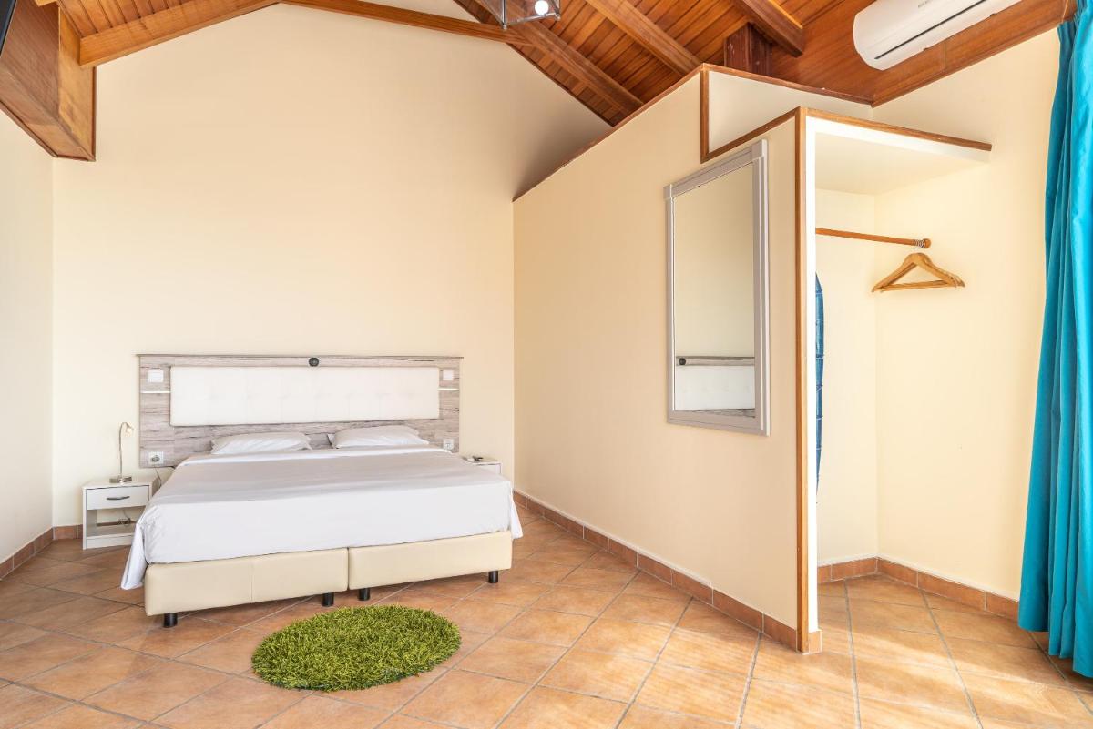 Uma cama ou camas num quarto em TarmarPlace