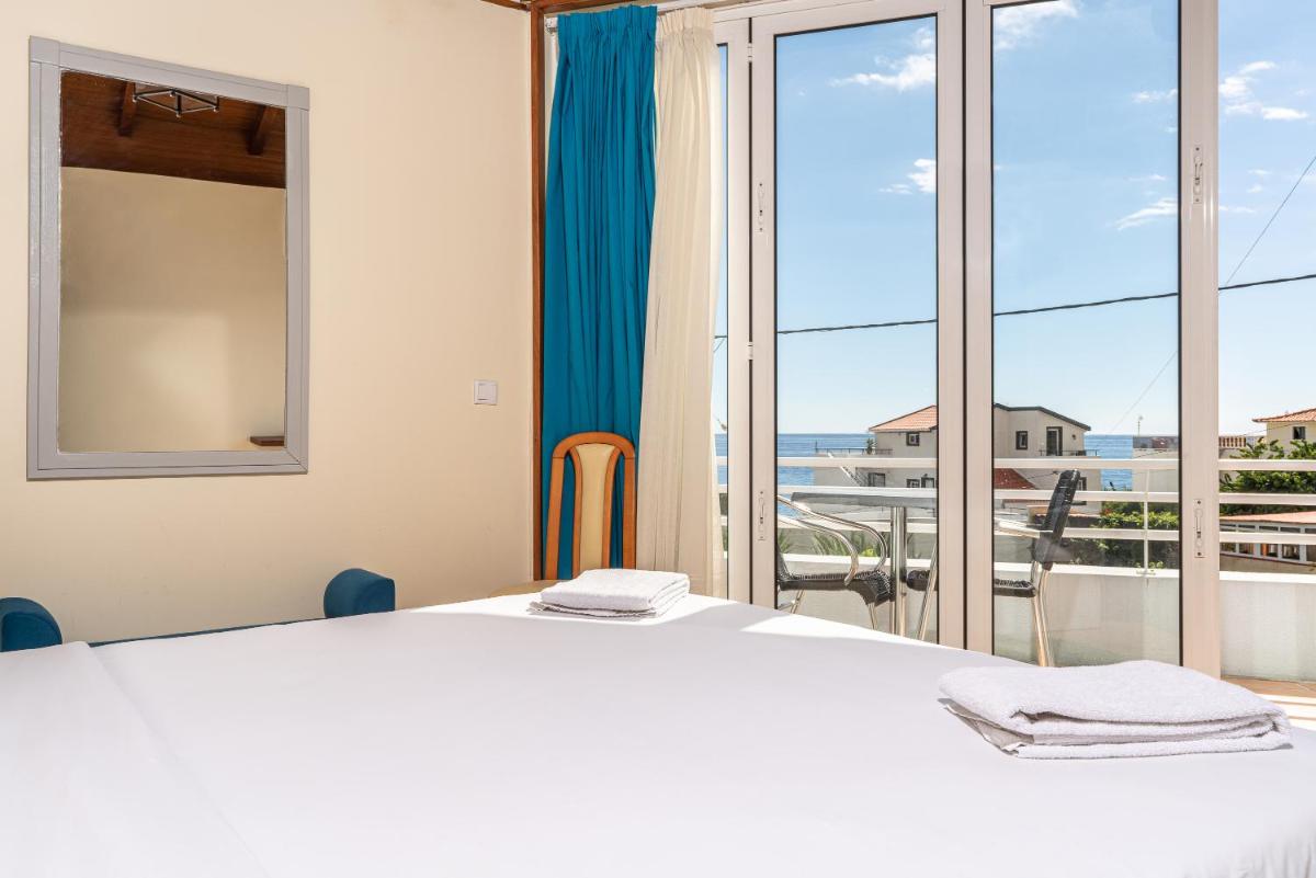 Uma cama ou camas num quarto em TarmarPlace