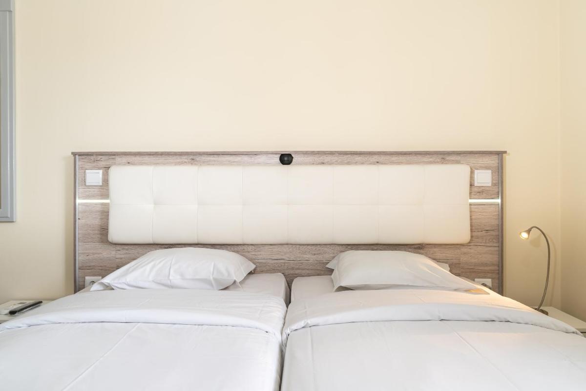 Uma cama ou camas num quarto em TarmarPlace