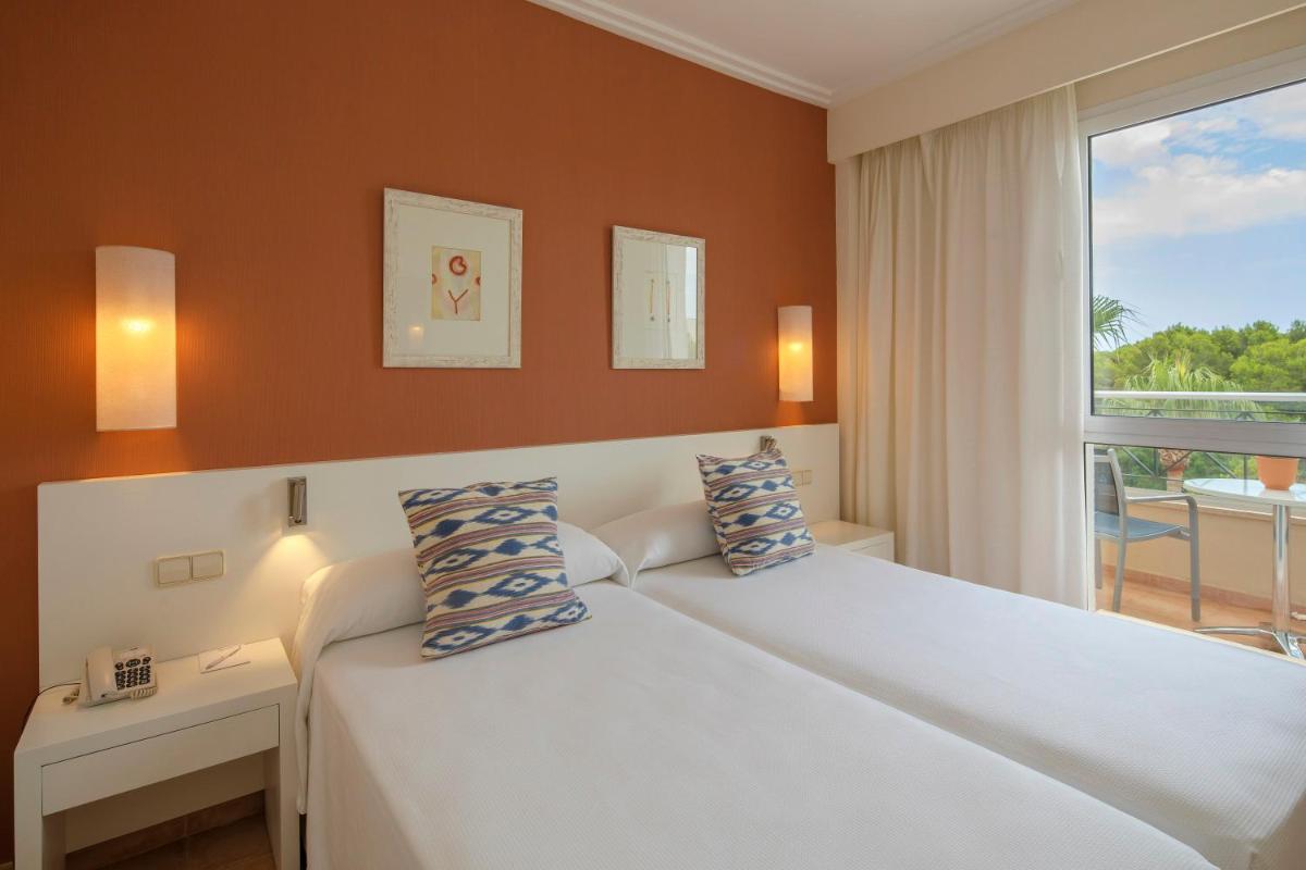 Cama o camas de una habitación en HM Mar Blau